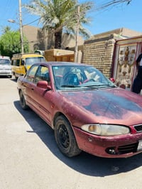 بروتون ويره موديل ٢٠٠٢ سياره بلاديه رقم انكليزي جديد مصفره غرامات تحوي...