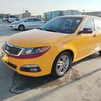 اوبتيما ٢٤٠٠ • ٢٠٠٩ • رقم واسط