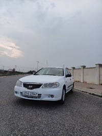 نيسان صني • ٢٠٣١ • توماتيك