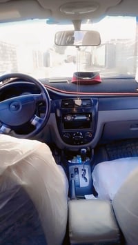 عندي اوبترا موديل ٢٠١١ خليجي رقم ديالى نكليزي السنويه بسمنه السياره بي...