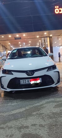 � للبيع كورلا 2025 وارد الصين 🚗 ▫️ اللون: أبيض ▫️ داخل: جلد أحمر ▫️ ال...