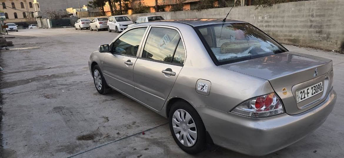 لانسر مۆدێل 2010 تۆماتیک بیلاد مەکینە گەورەو 
نمونەیە ناوزەردو فۆڕمیکا و بستێێک لەسندوق بۆیاغە  و سویچ کۆنتڕۆڵ و قفڵ مەرکەزی مەکینەو گێڕو تەبرید و ساردی و گەرمی هەموی بەشەرت سەنەوی تازەیە و بەناوی خۆمانە نرخی 90$ ومعامەلە.
ناو نیشان ڕانیە .. 
***********
*********** رانية, السليمانية
