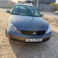 لانسر ٢٠١٠ • رقم قادسيه • سند دولي ٢٠٣٠