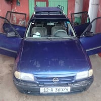 سيارة استرا كير عادي موديل 1992 رقم دولي+ بطاقة بنزين + شرط التحويل لل...