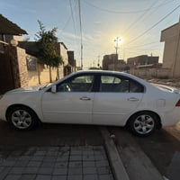 اوبتما2008 ابيض مصبوغه حزام للجماليه وشرط الفحص ماعدا القماره بلادي كي...