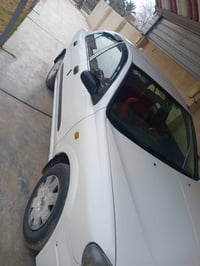 صني ٢٠٠١ • مكينة وكير مكفولة • تاير جديد