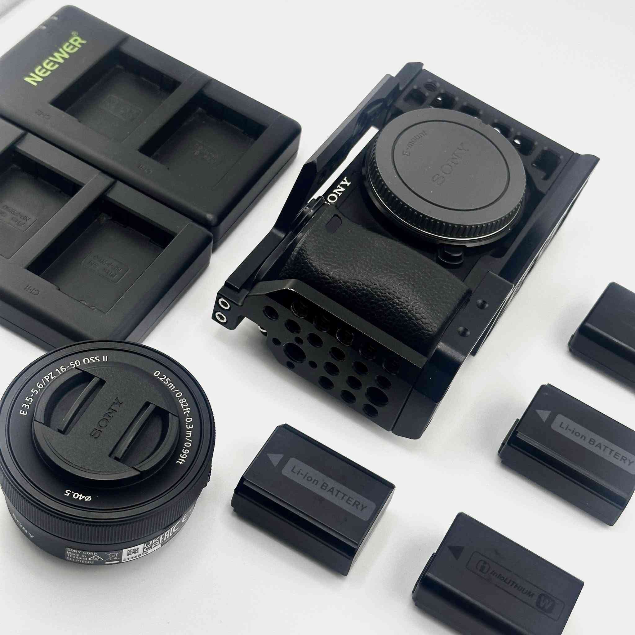 Sony A6400 Mirrorless Camera Kit
🔹 24.2 MP APS-C Sensor  
🔹 Sony 16-50mm OSS II Lens  
🔹 4K UHD Video Recording  
🔹 Real-Time Eye Autofocus  
🔹 180° Flip Screen  
🔹 Professional Aluminum Cage

📌 Accessories:
• 4 Batteries  
• Dual NEEWER Chargers  
• Original Strap  
• Original Box

📌 Shutter Count: 56,000

📌 Condition: Excellent

🗒️ الملاحظات:
نظيفة جداً، استخدام مرتب وشخصي، السنسر نظيف جداً وتعمل بدون أي مشاكل.  
مناسبة جداً للتصوير الاحترافي

💰 Price: 999 IQD

🚚 توصيل متوفر لجميع محافظات العراق مكاني بغداد


**إذا كنت صاحب هذا الإعلان وتريد حذفه لأي سبب، رجاءا أرسل رسالة إلى الدعم الفني**