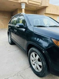 للبيع كيا سورنتو 2012 وارد امريكي رقم بغداد انكليزي بسمي  السياره مصبو...