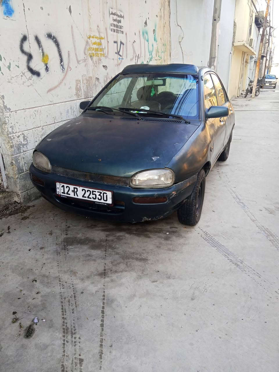 مازدا حجم 121نينوى موديل 1991رقم انكليزي بسمي محرك بدايت نفخ كاربون بانزين ورقي شرط الوكالة وتحويل السعر 18ورقة وبيها مجال الاتصال على الارقام ***********/***********
