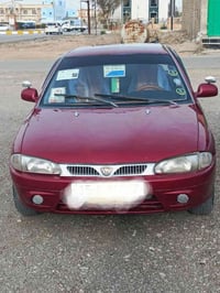 بروتون • ٢٠٠٣ • مستعجل