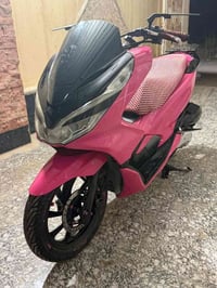 بي سي اكس • الجيل الأول • ابيض وردي