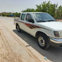 نيسان بيكم • دبل • ٢٠٠٣