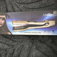 مكواة فرد الشعر • نظام