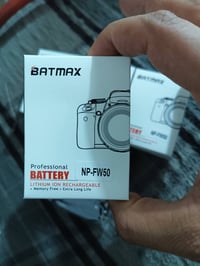 ٤ بطاريات وشاحن • NP-FW50 • ٢٠٠٠mAh