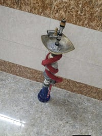نركيله طه • مطبوعة إنجليزي • دخان كثيف