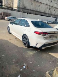 كورلا موديل ٢٠٢١ وارد أمريكي ابيض ثلجي بانزين LE محرك ١٨٠٠ المرغوب رقم...