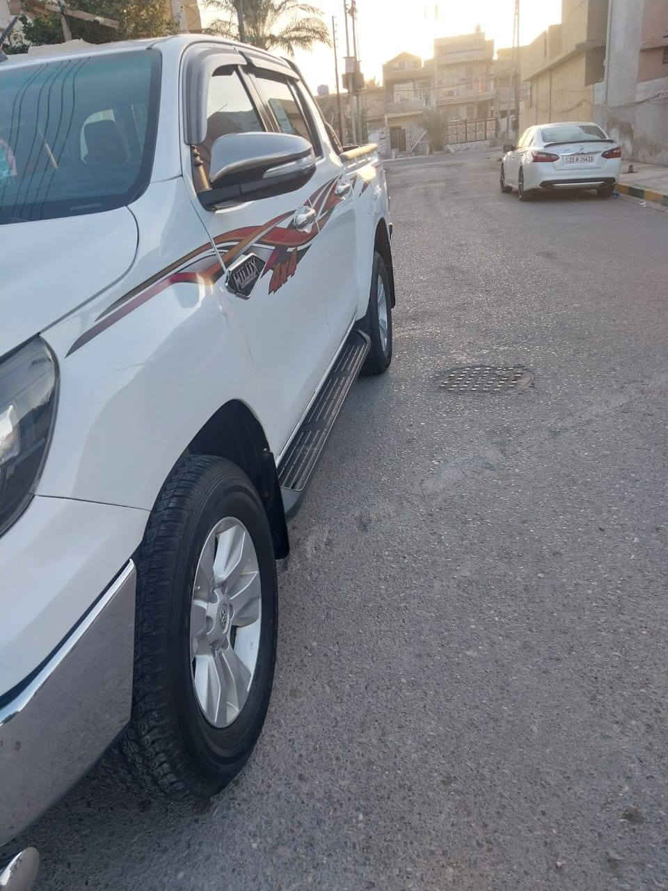 سلام عليكم سياره للبيع تويوتا هايلكس فورويل سياره مكفولة من صبغ ومن ضربة سنوية جديدة موديل2016 تبريد مامي خلفي رقم بغداد مرحبا تريد تحويل ثاني م  سيارة ماشية 125 كير وتماتيك تبريد قطعتين ثلج هاذة رقم هاتف ***********. *********** عنواني. ديالى بلدروز
