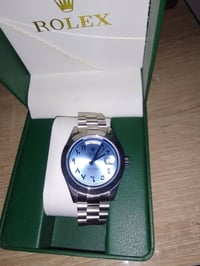 روليكس • اصلي • الوقت واليوم عربي