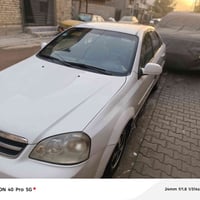 اوبتره ٢٠٠٨  بغداد خصوصي ماشيه ١٥٥ ألف بدون صبغ بيها بس باب مبدل وره ا...