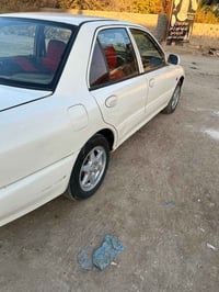 بروتون ويرا • ٢٠٠٤ • رقم بغداد