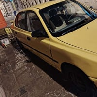 اكسنت • ٢٠٠٠ • مكينة كورلا