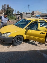 لانسر ٢٠١٠ بسمي سيارة كاملة بي تبخير ٠٧٧٢٧٧٦٣٩٦٨