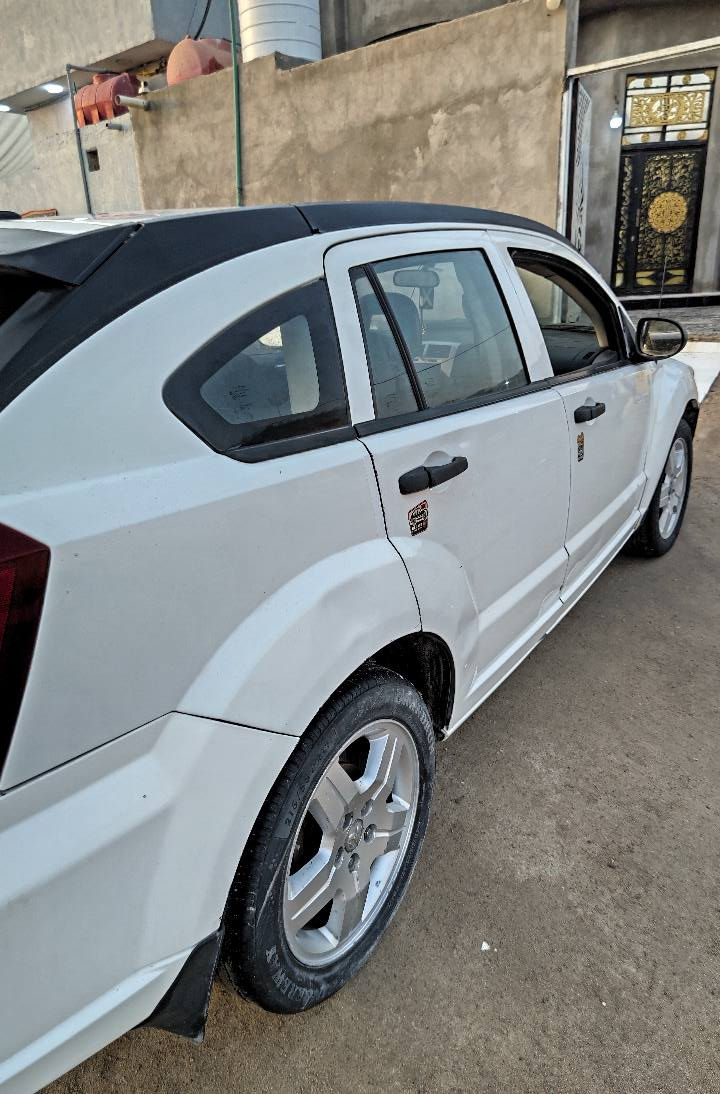 دوج كاليبر 2008 رقم بغداد مشروع وطني السياره بيهه كازكيد بس تمشي مكان السياره البصرة شط العرب رقم *********** واساب شط العرب, البصرة
