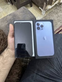 ايفون 13برو ماكس على ايدي  شرق اوسط  بطارية 73 ذاكرة 256 ظهر مكسورمثل ...