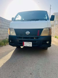 نيسان يورفان 2009رقم بغداد للبيع 07824314222
