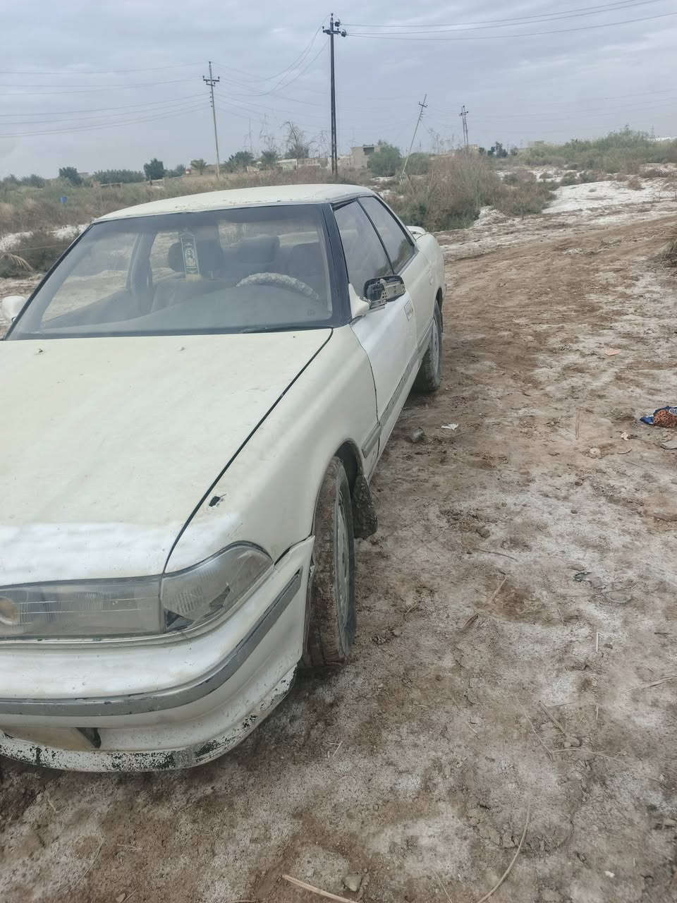 سياره مارك عضم بيضاء اللون للبيع مكينه وكبر ونجي 2000رياضي جديد باتري جديد حداديه حلوه تخم تاير سنويه الى28مكان للسياره ذي قار رفاعي موبايل ***********السعر حلو 29 رقمها ميسان @
