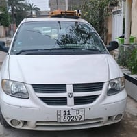 دوج كرفان موديل 2001 رقم بغداد باسمي السعر 65 للاستفسار 07715401883