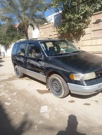 نيسان كوست • ٧ راكب • موديل ٩٣