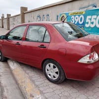 لانسر ٢٠١٠ • ٤ قطع صبوغ • كركوك