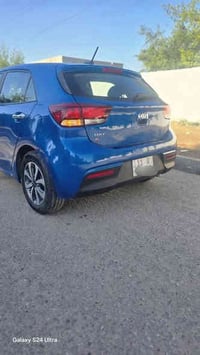 عندي كيا ريو ٢٠٢٣ فئة s لون ازرق مميز ايرباك كل سليم بدون تبديل بنيد ر...