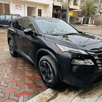 نيسان روج موديل ٢٠٢٥ مواصفات sv مرقمة بغداد  ماشية ٩٠٠٠ 07832618276