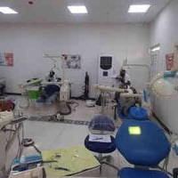 علاج مجاني • حشوة وقلع • كلية طب الأسنان