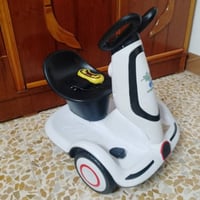سيارة أطفال • ريموت كنترول • يعوزها باتري