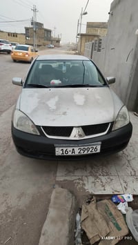 وبركاته للبيع سيارة لانسر موديل ٢٠١٠ رقم قادسية انكليزي بأسمي مداور مب...