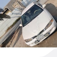 بروتون 2002 رقم بغداد السعر 29 للاتصال 07723699913