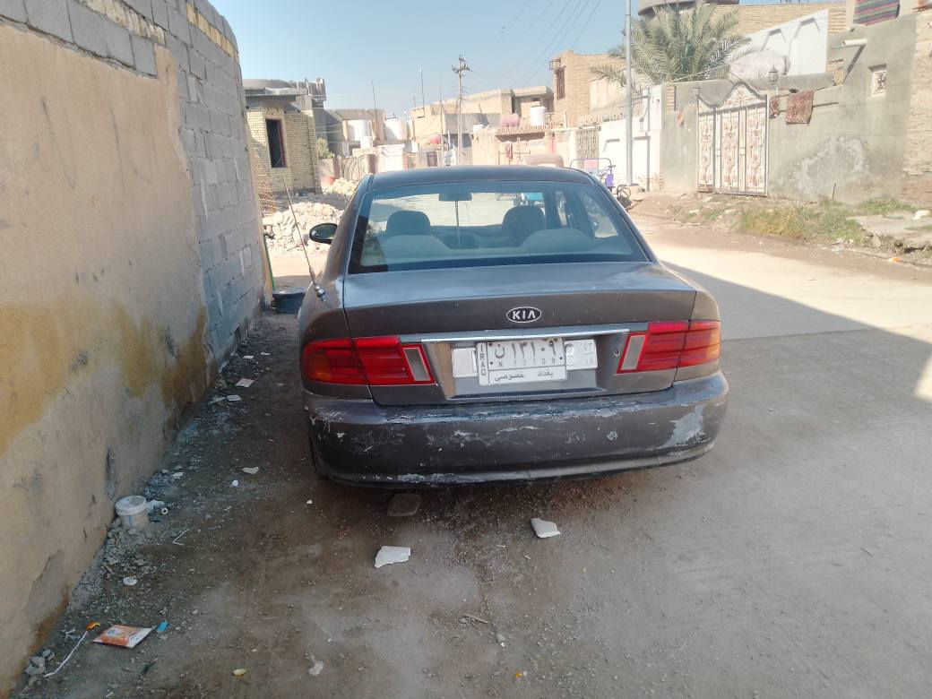 كيا اوبتيما موديل 2001 بغداد سنويه نافذه مكفوله ضربه كص جارده  بلاد السعر 45 وبيه مجال عنوان قلعة سكر تليفون *********** الرفاعي, ذي قار

