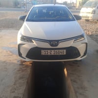 كورلا هايبرد 2024مكفوله  كفاله عامه ماشيه 9الف سياره بعته بحاله الزيرو...