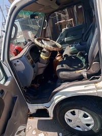 سياره للبيع موديل 2001 رقم بغداد بأسمي مكان السياره بغداد 07703854221
