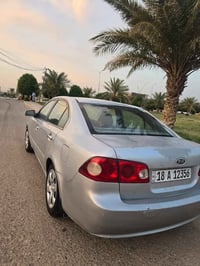كيا اوبتما • مكينة 2400 • رقم بابل