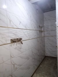 وسطه كاشي مرمر موسلين هدا شغليه يده مو رقم واحد يرجع 07774485789