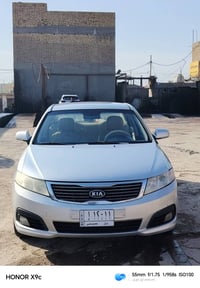 كيا اوبتما 2009 للبيع  مكينه 2000  خليجي  بيها صبغ بالجاملغ الأمامي شب...