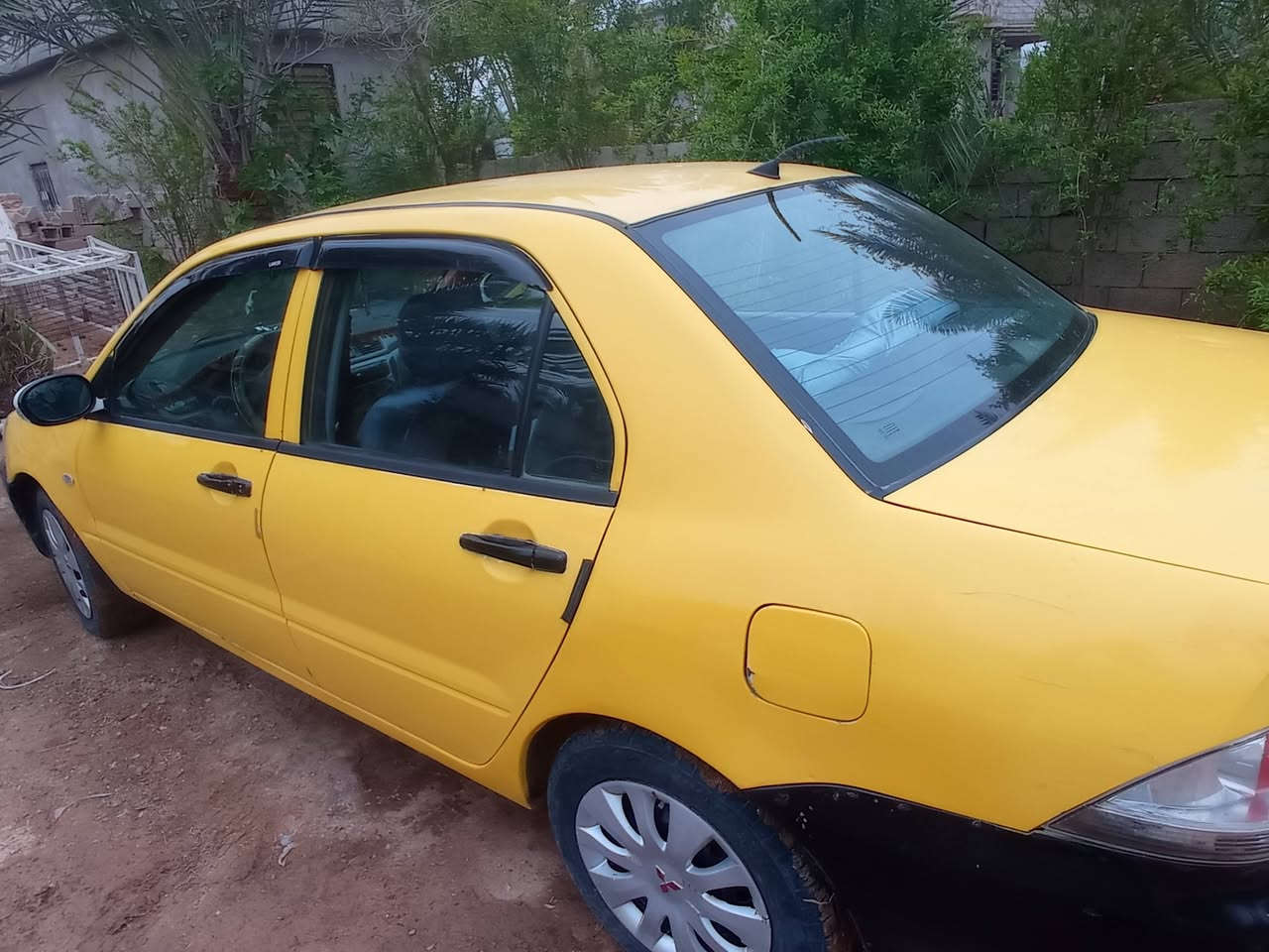 لانسر 2010 بسمي مصفره كامل سنويه 31 رقم بغداد    سعر 64 وبيه مجال حك الجيه ***********
