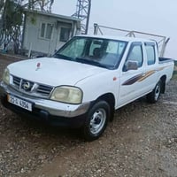 نیسان پیکئاپ 2009 یابانی پارچە ڕەش  لە ساغی بێ دەعم و بێ لێدران  گیڕو ...