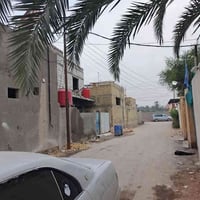 أبي لخصيب شارع الوسطي • ٢١٠م • بيت طابقين