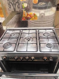 طباخ 5 عيون شغال  و ساحبه للبيع 07709866468