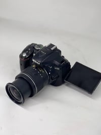 نيكون D5300 • كاميرا • شاتر ١٠٠٠٠